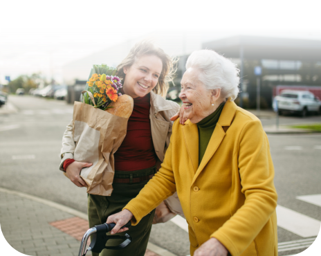 Woman and senior woman smiling