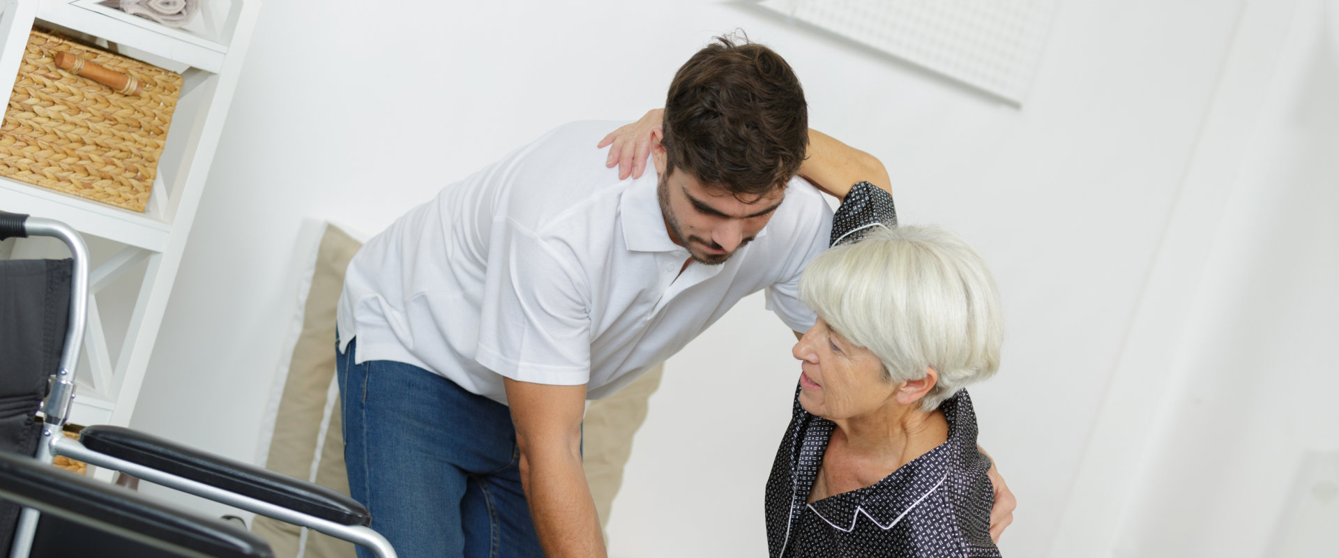 man helping the senior woman