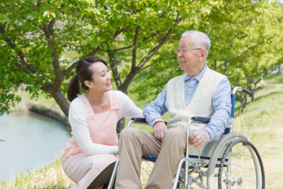 woman and senior man smiling