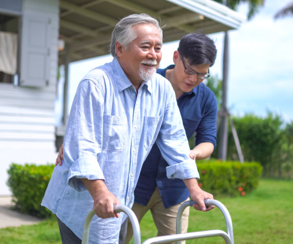 man taking care of the senior man