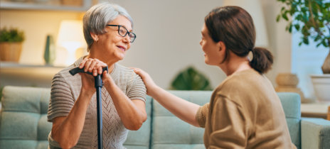 woman and senior woman looking at each other