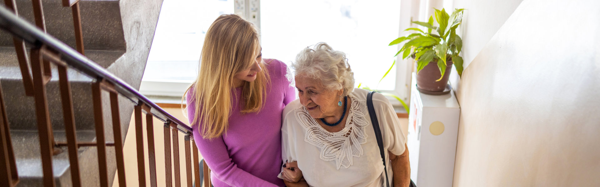 woman taking care of the senior woman